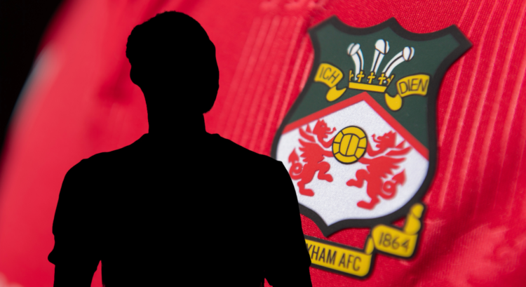 The silhouette of Arthur Okonkwo with a Wrexham shirt behind him.