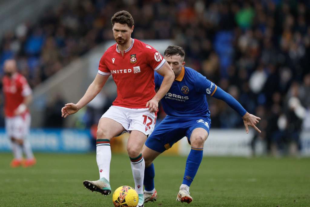 George Evans in action during Shrewsbury Town v Wrexham in the Emirates FA Cup Third Round clash.