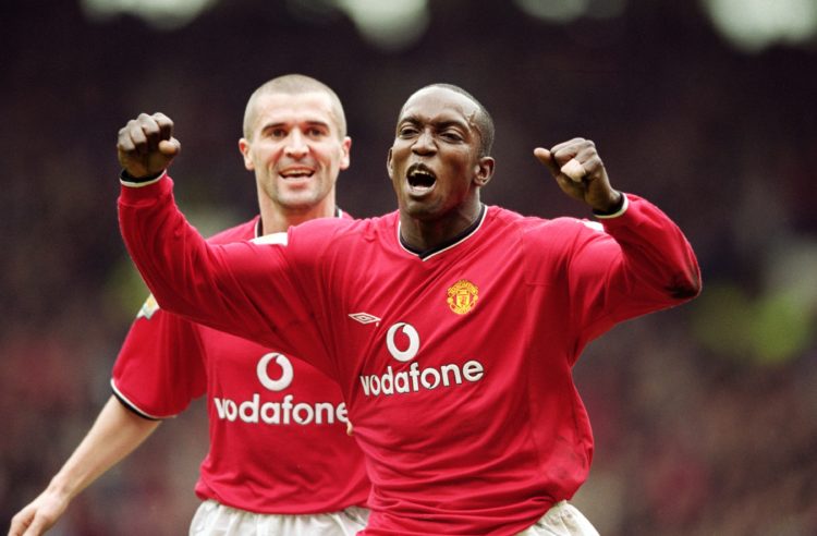 14 Apr 2001:  Manchester United goal scorer Dwight Yorke is congratulated by team mate Roy Keane during the FA Carling Premiership match against Co...
