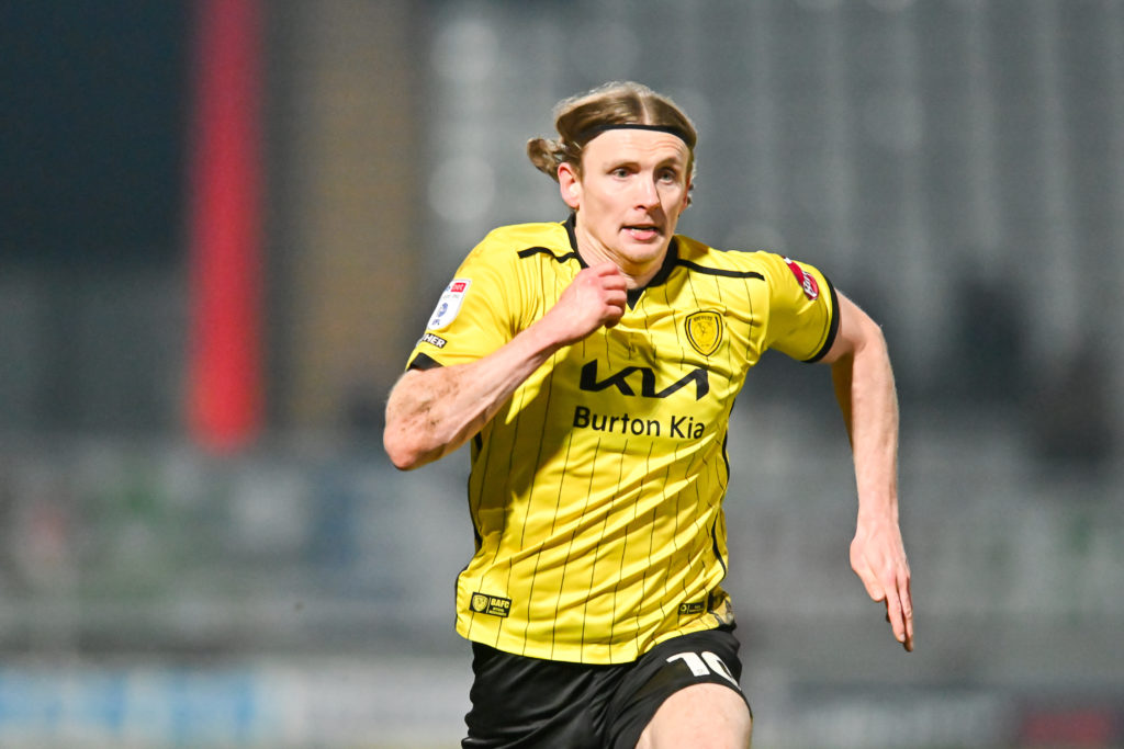 Jon Dadi Bodvarsson playing for Burton Albion in a game against Stevenage.