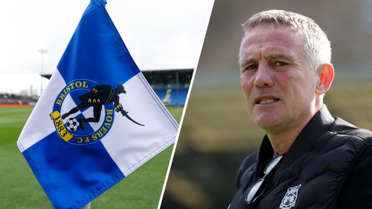 Wrexham manager Phil Parkinson looks on and the Bristol Rovers flag.