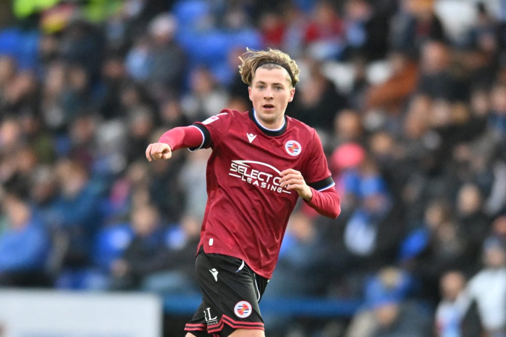Reading midfielder Charlie Savage in action against Peterborough United.