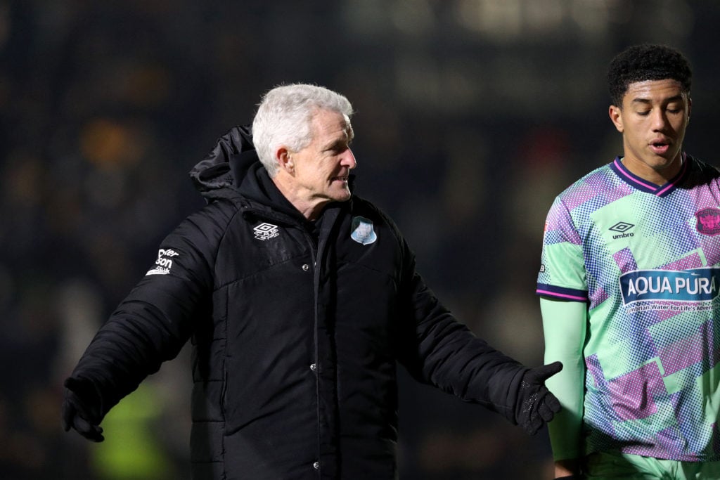 Carlisle United boss Mark Hughes gestures against Newport County