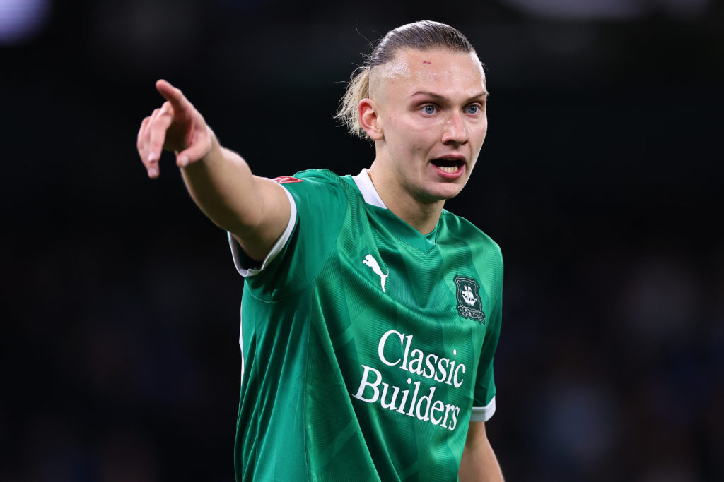 Plymouth Argyle's Maksym Talovierov in action against Manchester City.