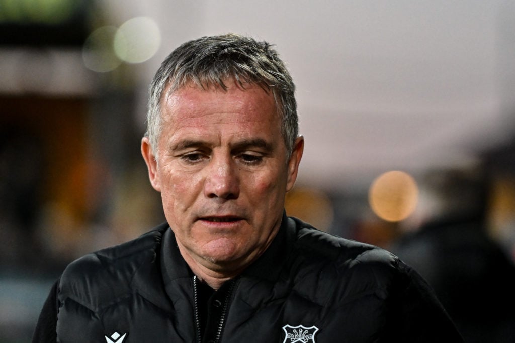 Wrexham boss Phil Parkinson looks on against Cambridge United.