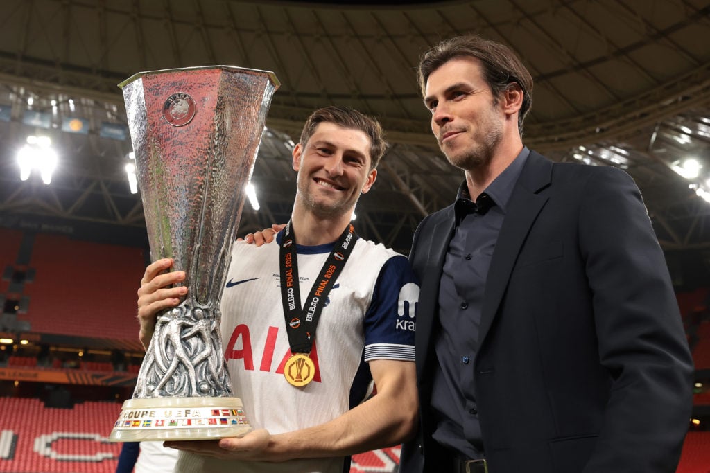Ben Davies and Gareth Bale celebrate with the UEFA Europa League trophy after Tottenham Hotspur v Manchester United in the UEFA Europa League Final 2025.