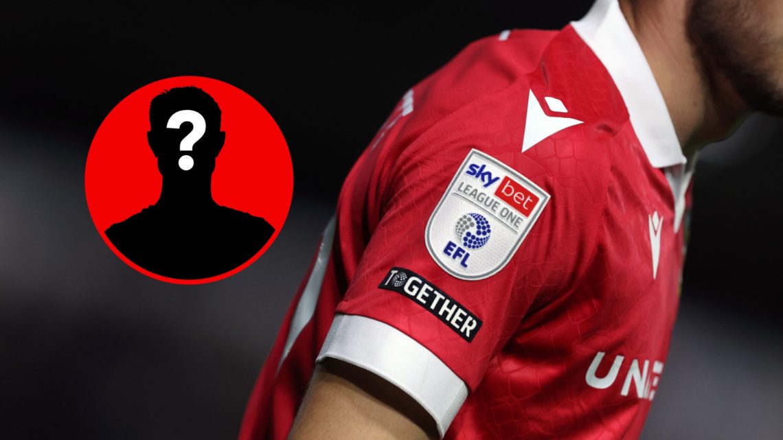 A close up of the EFL League One logo on a Wrexham shirt.