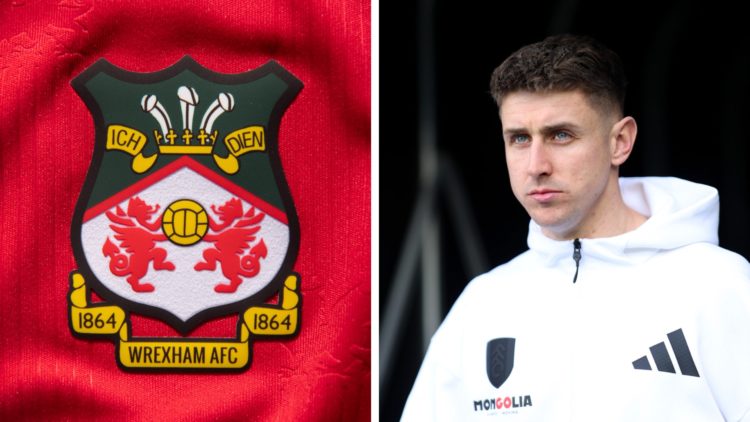 The official club badge of Wrexham AFC on a home shirt. Fulham midfielder Tom Cairney looks on.