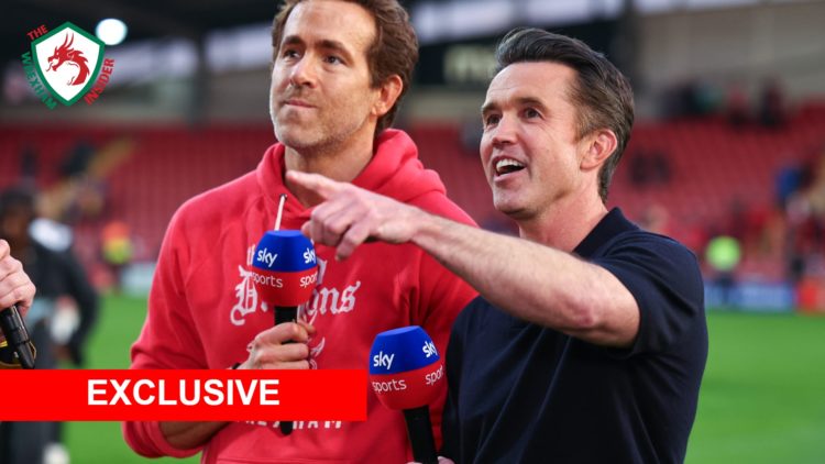 Wrexham co-owners Ryan Reynolds and Rob McElhenney celebrate winning promotion from League One.