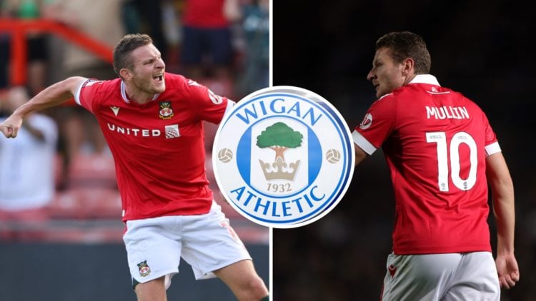 Paul Mullin of Wrexham celebrates victory during the Sky Bet League Two match between Wrexham and Doncaster Rovers. The club crest of Wigan Athleti...