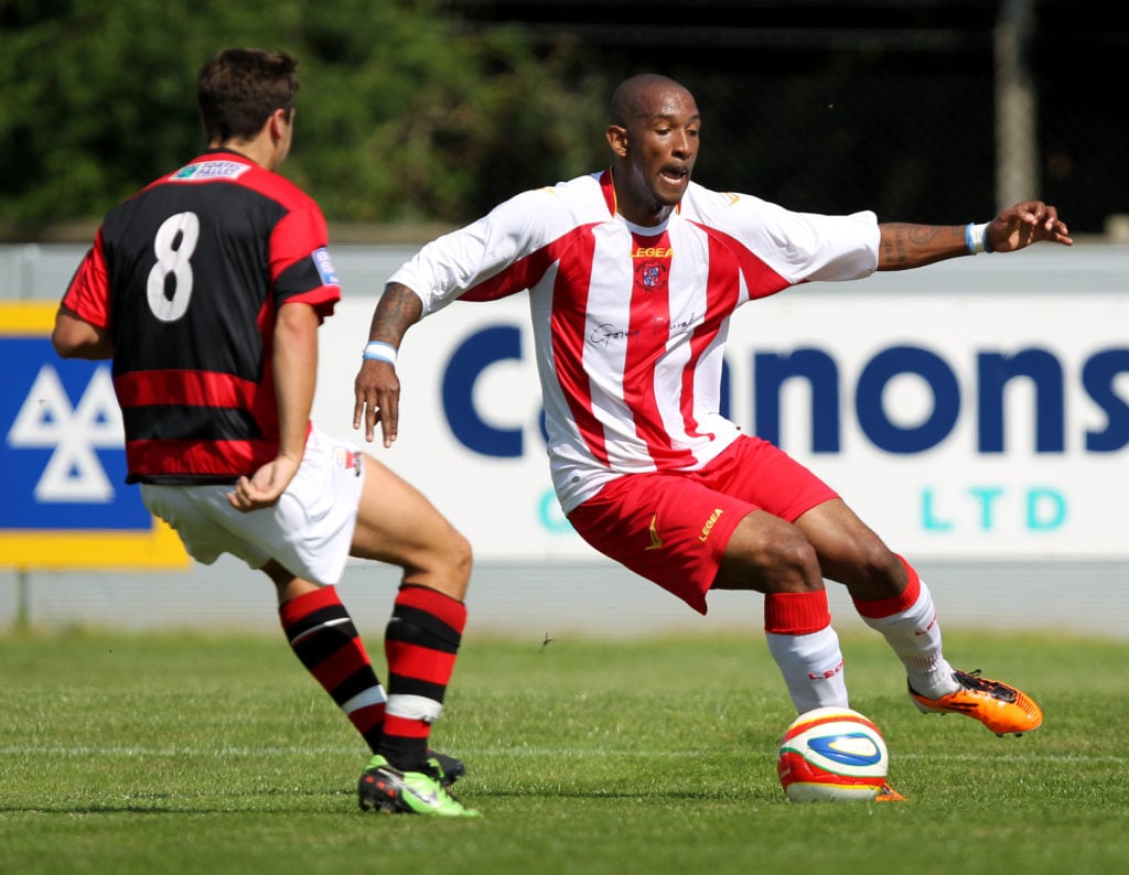 Jefferson Louis in action for Brackley Town against Nuneaton Town.