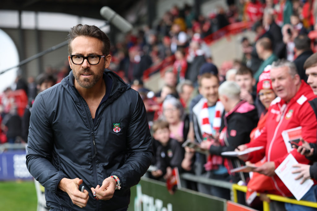 Ryan Reynolds signs autographs and has picture with fans ahead of the Vanarama National League match between Wrexham and Boreham Wood