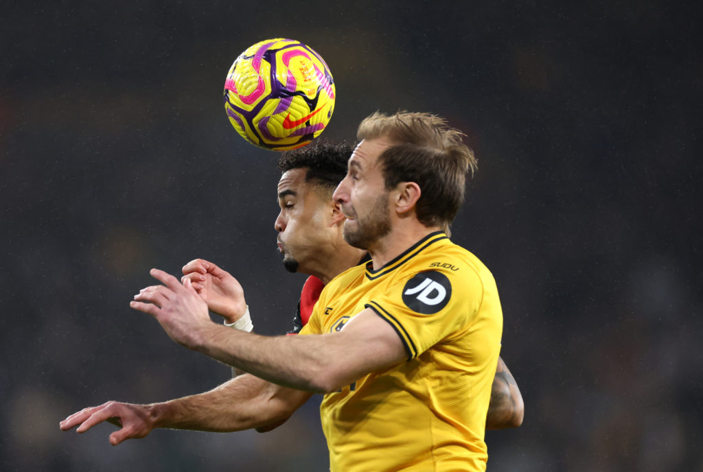 Craig Dawson challenges Justin Kluivert during Wolverhampton Wanderers FC v AFC Bournemouth in the Premier League clash.