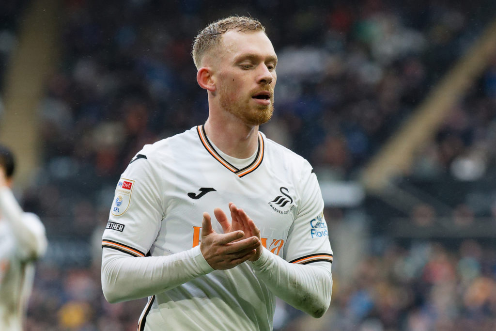 Lewis O'Brien of Swansea City applauds