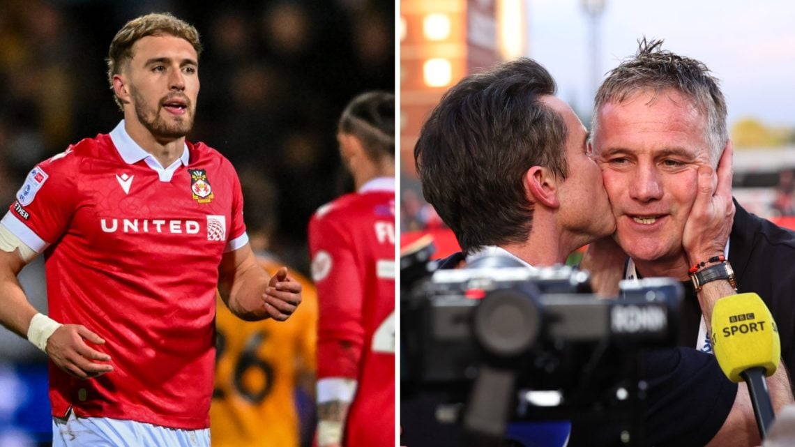 Sam Smith looks on during the Sky Bet League One match between Cambridge United and Wrexham. Rob McElhenney co owner of Wrexham kisses Phil Parkins...