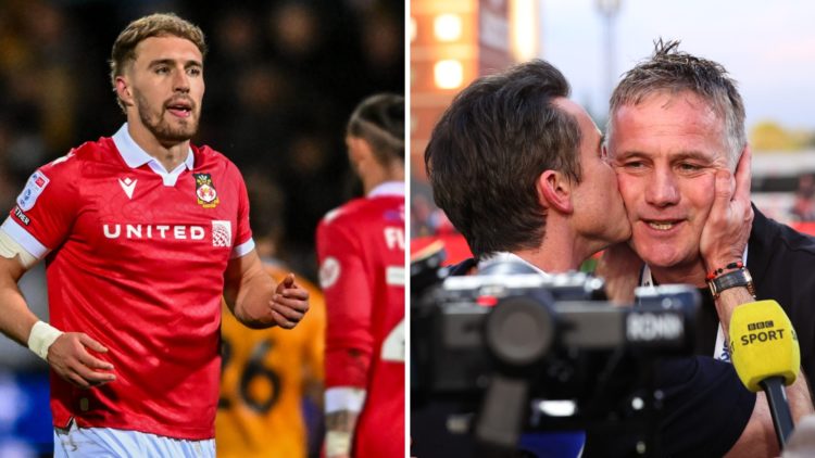 Sam Smith looks on during the Sky Bet League One match between Cambridge United and Wrexham. Rob McElhenney co owner of Wrexham kisses Phil Parkins...