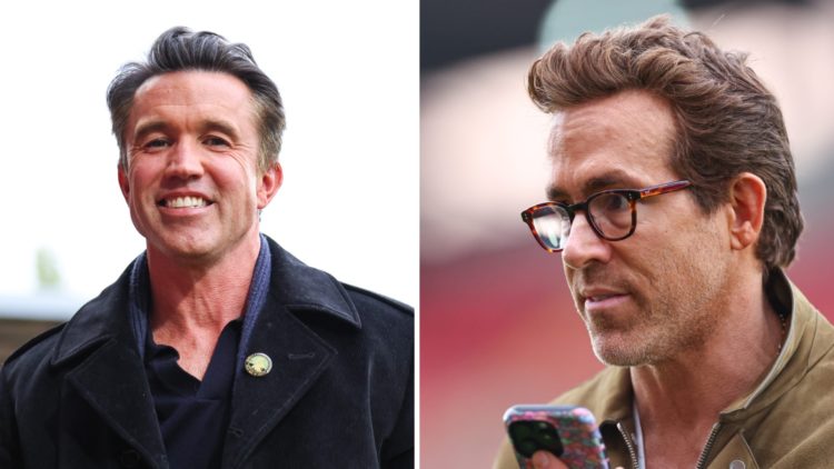 Ryan Reynolds co-owner of Wrexham oh the phone during the Sky Bet League One match between Wrexham AFC and Charlton Athletic. Rob McElhenney co-own...