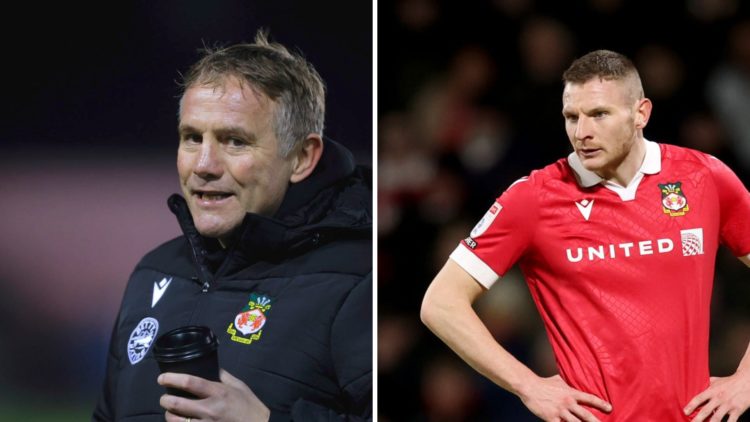 Phil Parkinson looks on during the Sky Bet League One match between Shrewsbury Town FC and Wrexham AFC. Paul Mullin during the Sky Bet League One m...