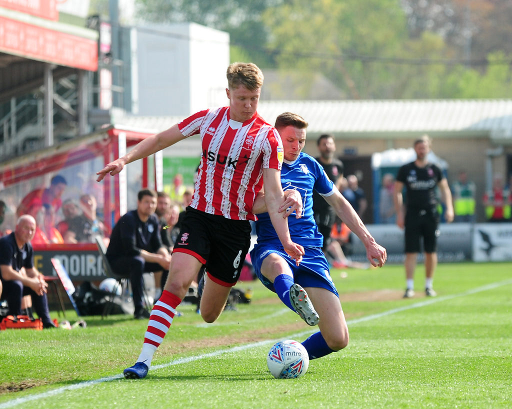 Lincoln City's Mark O'Hara vies for possession with Tranmere Rovers' Paul Mullin