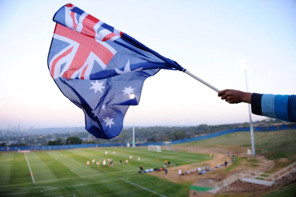 The flag of Australia being waved.