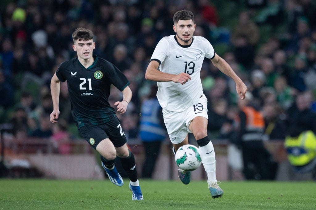 Liberato Cacace of New Zealand in action against the Republic of Ireland.