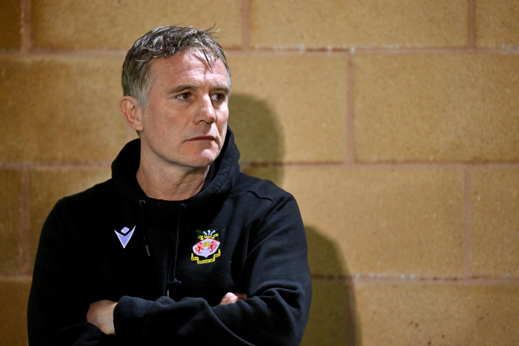 Phil Parkinson in the dugout during Forest Green Rovers v Wrexham - Sky Bet League Two