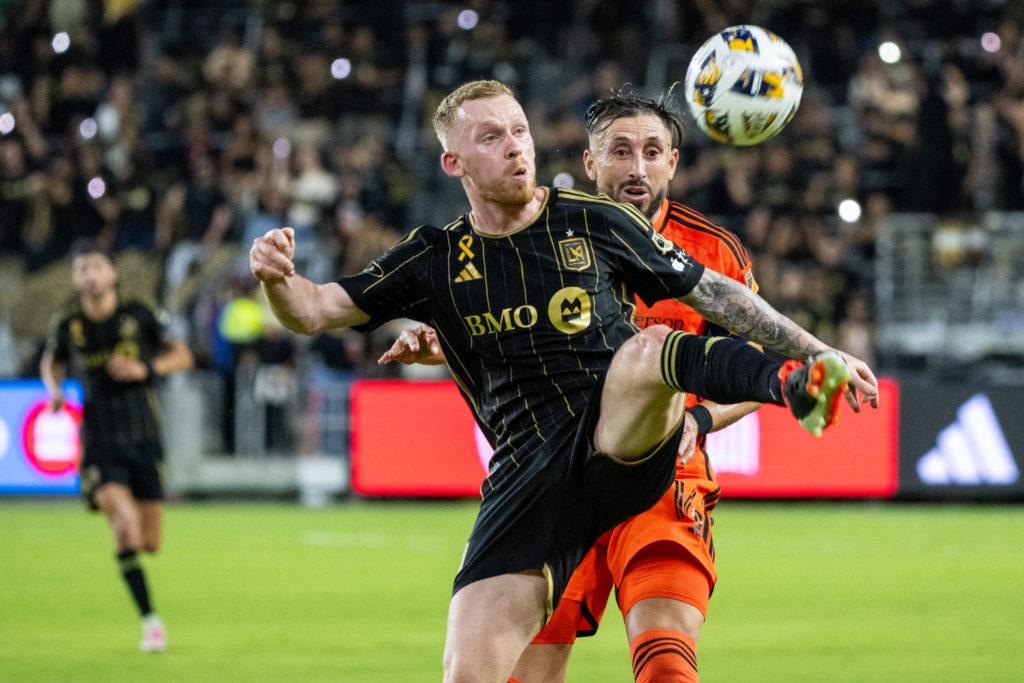 Lewis O'Brien #8 of Los Angeles FC battles Héctor Herrera #16