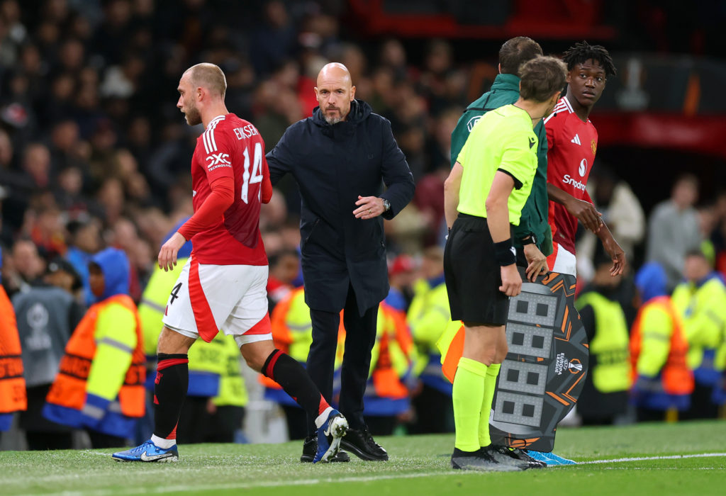 Erik ten Hag, Manager of Manchester United, interacts with Christian Eriksen