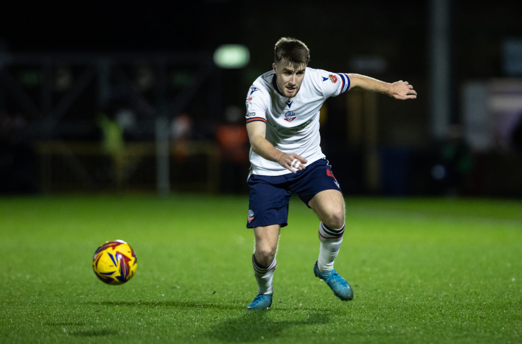 Bolton Wanderers midfielder George Thomason in action against Wycombe Wanderers.