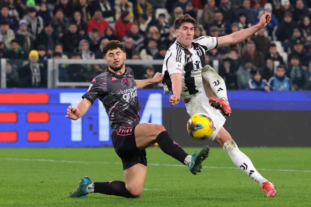 Dusan Vlahovic of Juventus anticipates Liberato Cacace of Empoli FC