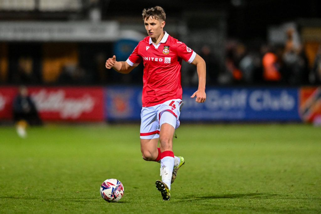 Max Cleworth (4 Wrexham) goes forward