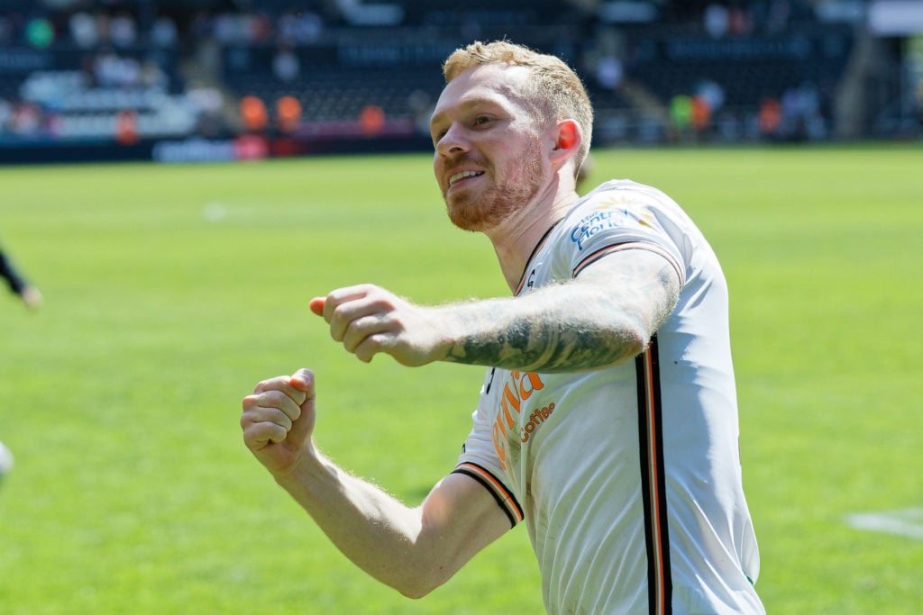 Lewis O'Brien of Swansea City celebrates