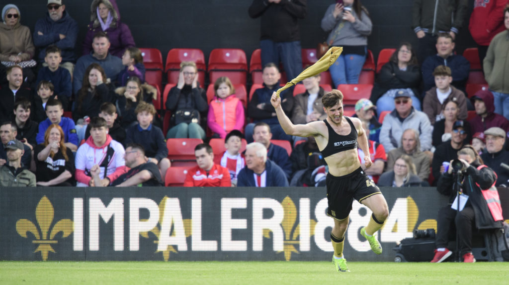 Ryan Longman of Wrexham celebrates scoring