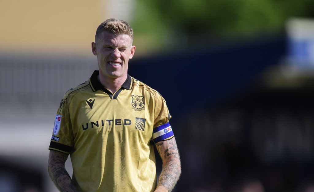James McClean of Wrexham reacts