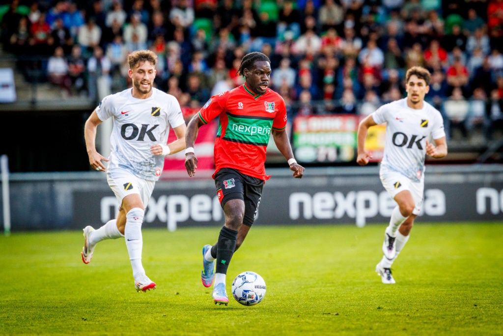 NEC's Sontje Hansen in action against NAC.