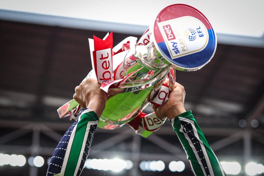 Sunderland's Jobe Bellingham lifts the Championship play-off final trophy.