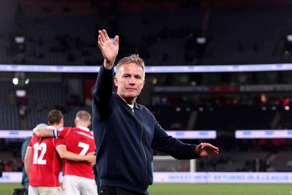 Phil Parkinson waves to supporters during the football friendly match between Melbourne Victory and Wrexham AFC