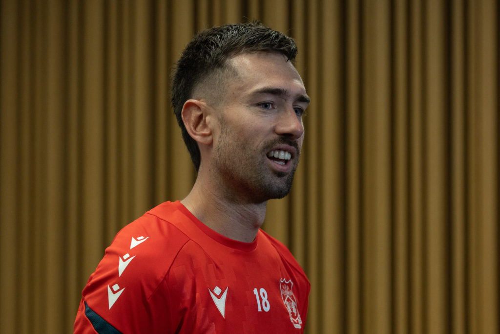 Ryan Hardie of Wrexham speaks at the press conference