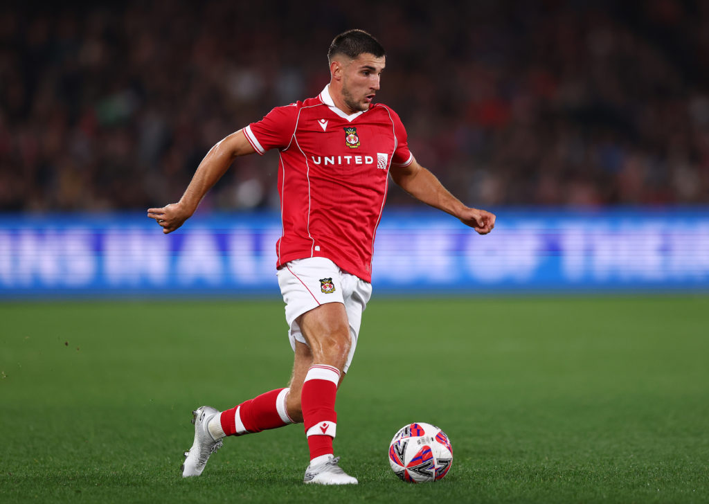 Ryan Longman of Wrexham in action