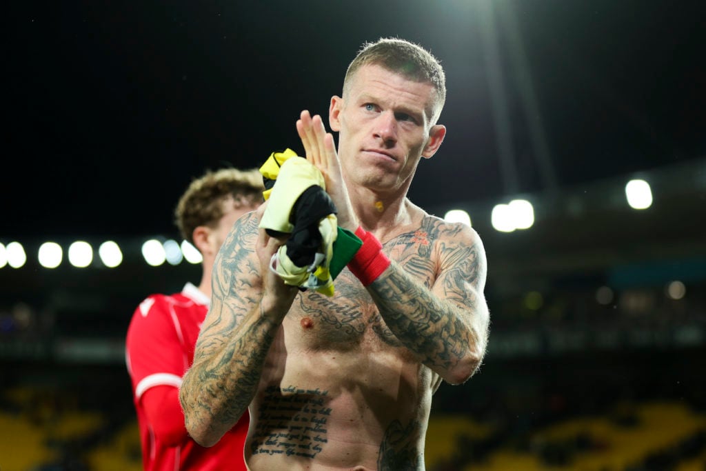 James McClean of Wrexham AFC applauds the crowd