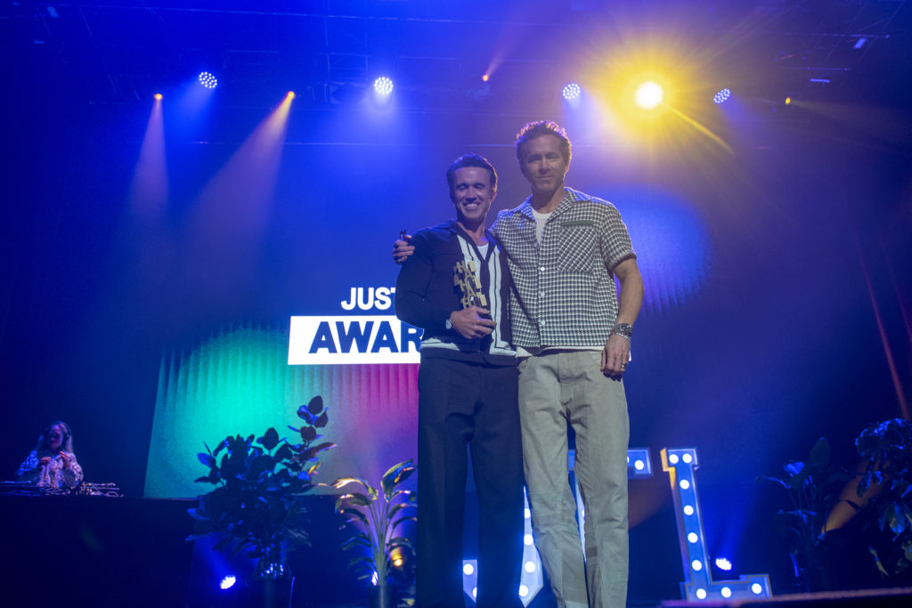 Ryan Reynolds and Rob Mac laugh during the Just For Laughs Awards Show