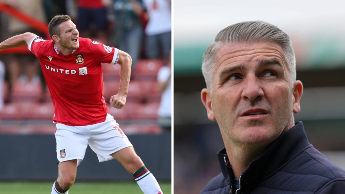 Paul Mullin of Wrexham celebrates victory during the Sky Bet League Two match between Wrexham and Doncaster Rovers. Wigan Athletic's manager Ryan Lowe