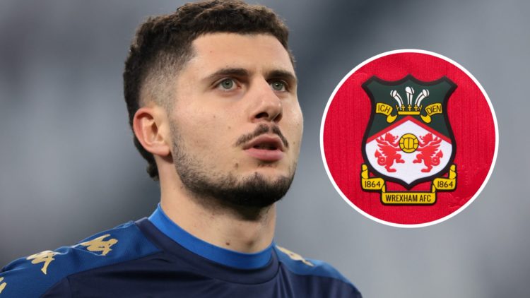 Liberato Cacace looks on during the warm-up prior to the Serie A match between Juventus and Empoli. The official club badge of Wrexham AFC on a hom...