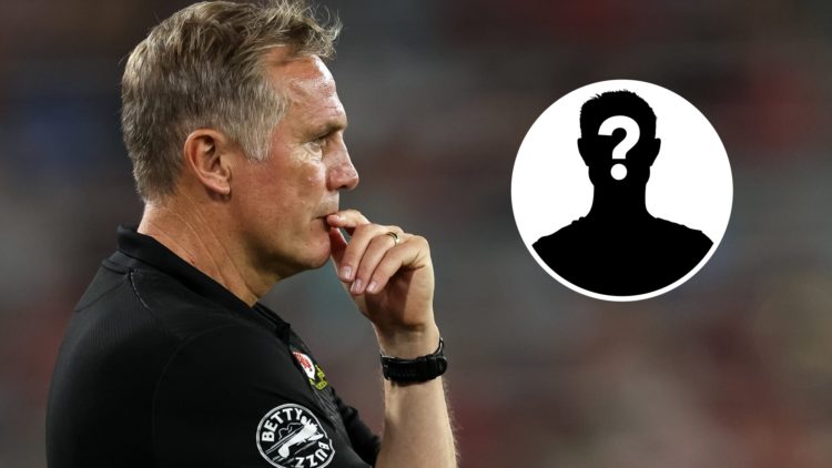 Wrexham boss Phil Parkinson looks on against Manchester Unied, Inset, a mystery player icon.