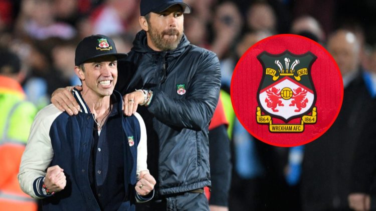 Rob McElhenney and Ryan Reynolds celebrate on the pitch after the English National League football match between Wrexham and Boreham Wood. The offi...