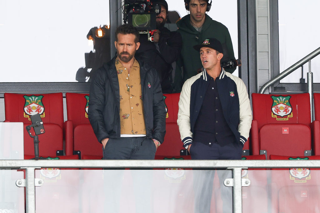 Wrexham owners, Ryan Reynolds (L) and Rob McElhenney (R) look on