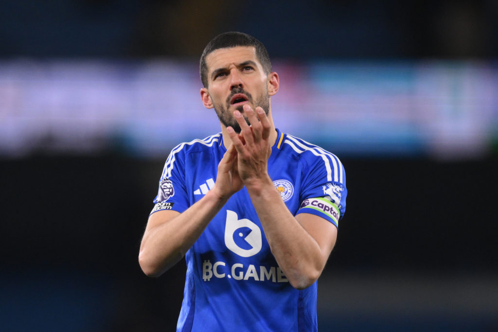 Leicester City defender Conor Coady applauds fans against Manchester City.