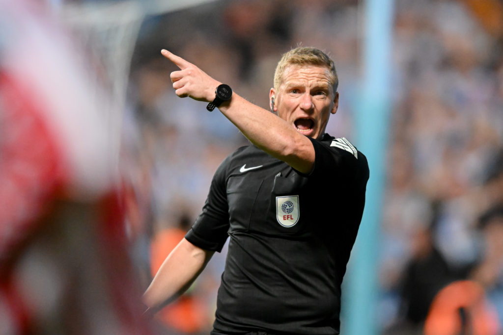 Referee John Busby shouts instructions during the Sky Bet Championship Play Off Semi Final match.