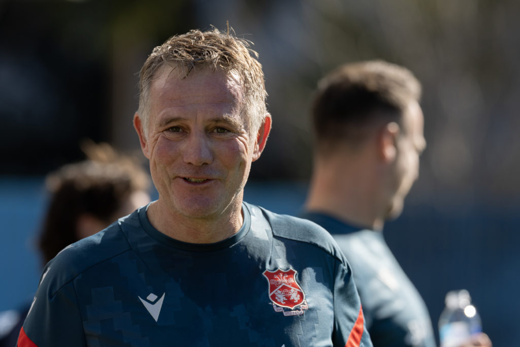 Coach Phil Parkinson of Wrexham AFC looks on