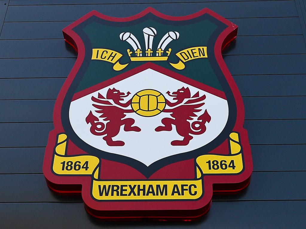 Detailed view of a Wrexham club crest ahead of the Carabao Cup first round match between Wrexham and Hull City.